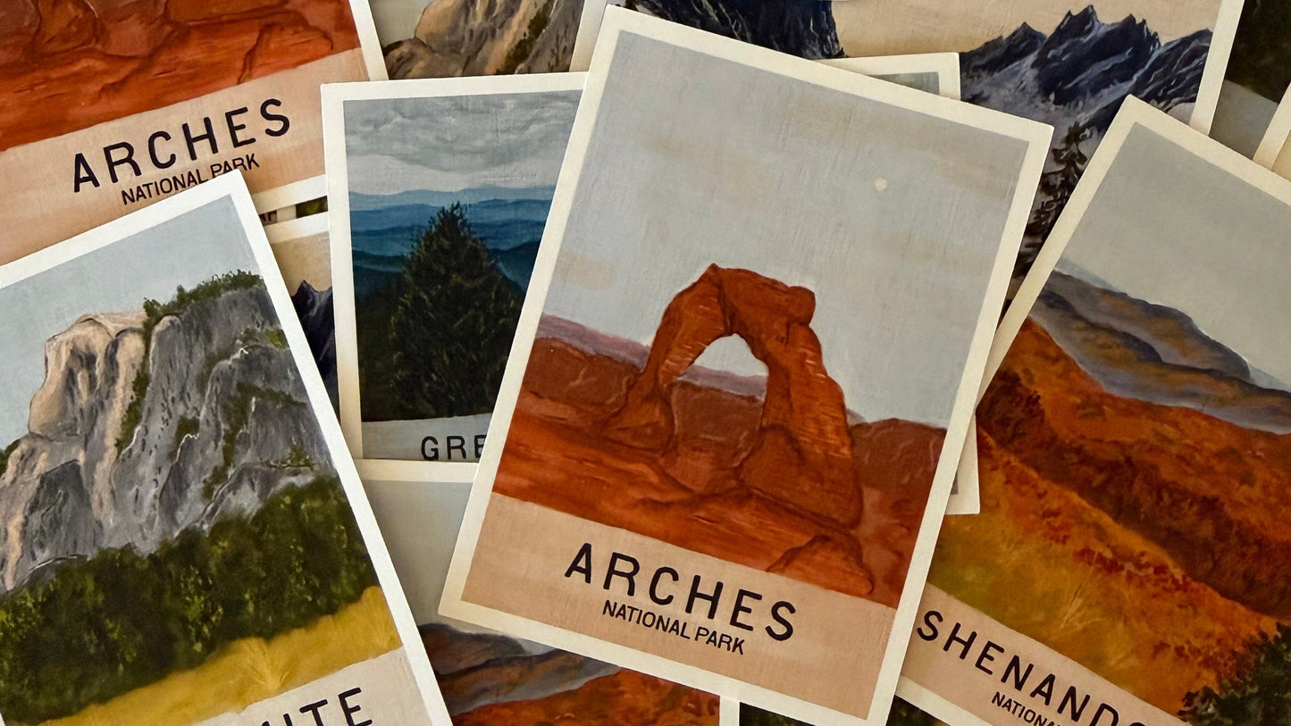 Collection of national park postcards featuring Arches, Yosemite, and Shenandoah.